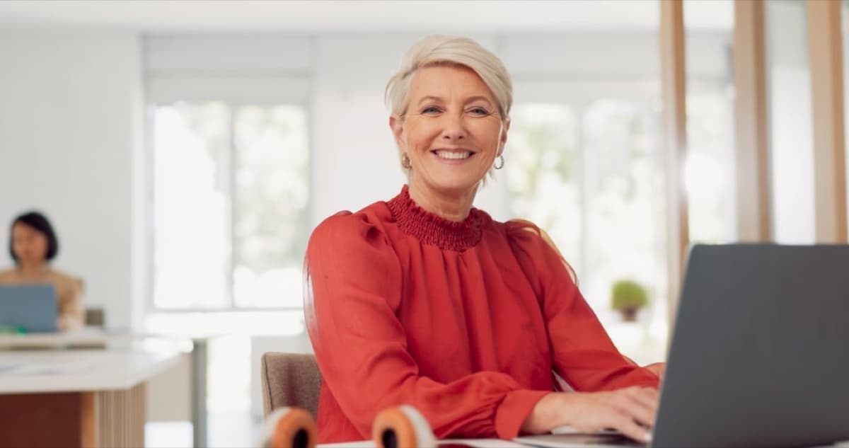 Client-side coordinator reviewing approvals at her desk